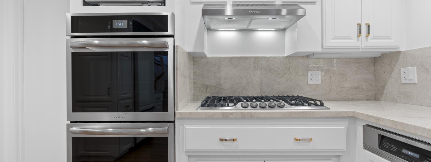 Oven, Microwave, Gas Cooktop, Hood Vent, and Dishwasher