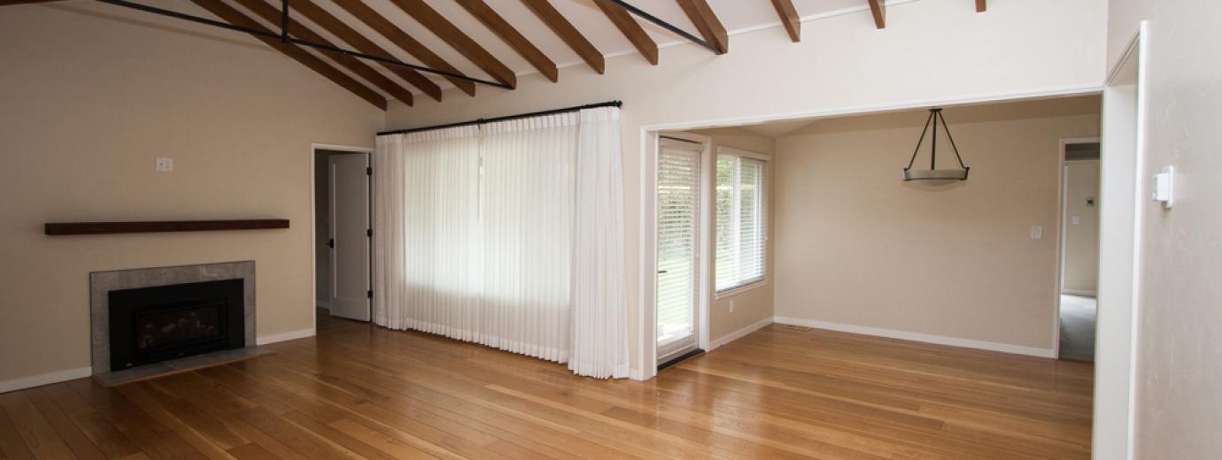 Open room with beamed ceilings