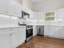 Kitchen with Gas Range, Microwave, and Dishwasher