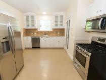 kitchen with fridge and oven