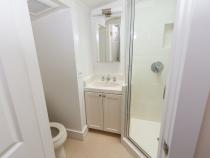 bathroom with white vanity and mirror